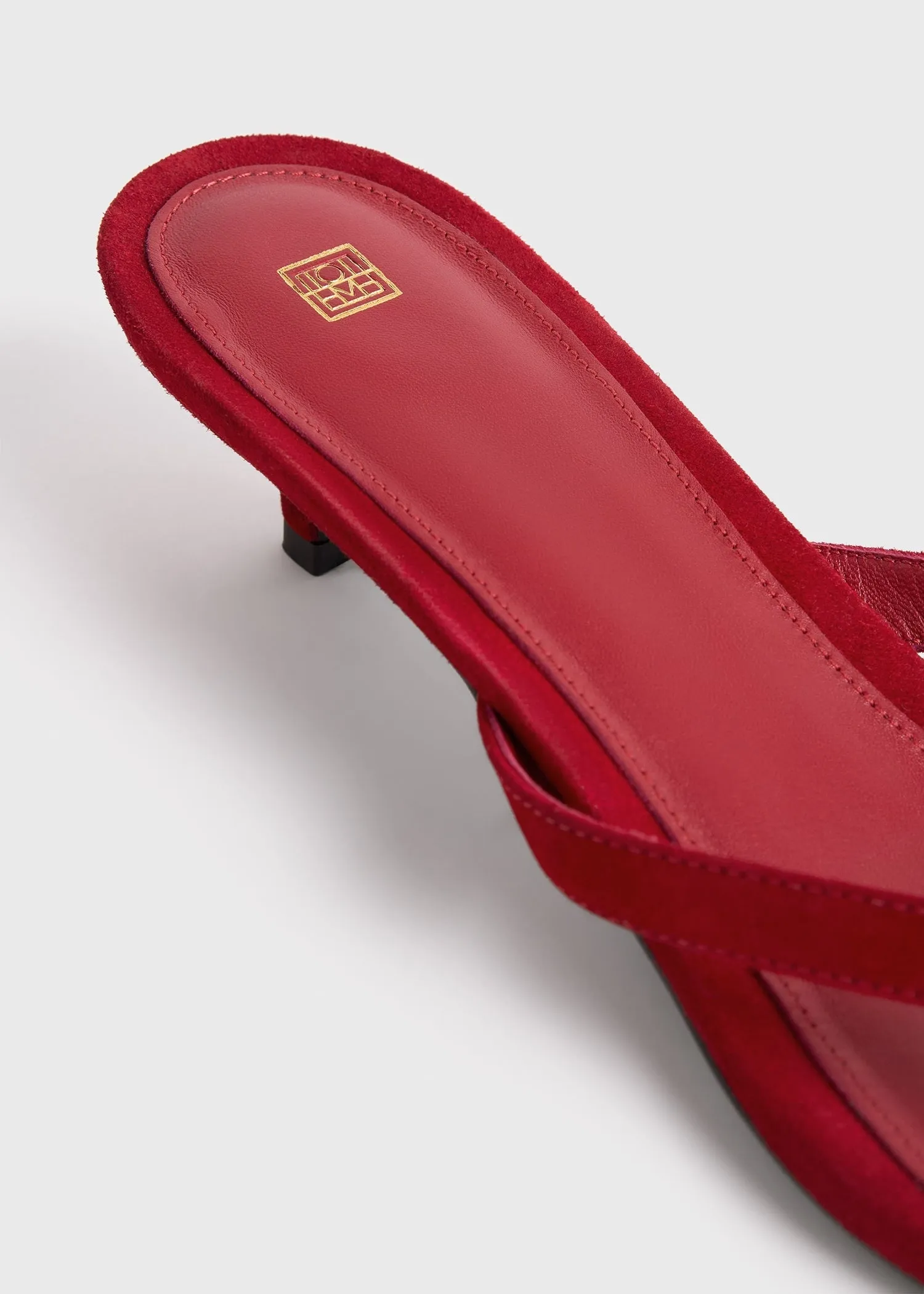 Suede heeled flip flops scarlet